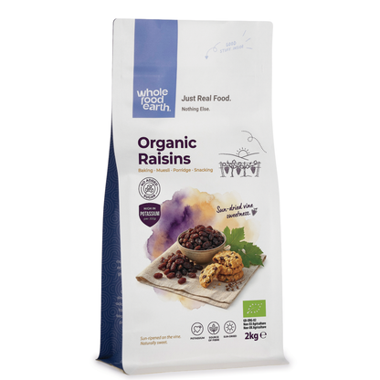 Organic raisins from Whole Food Earth, dried fruit in a clear bowl showing plump, sweet dried grapes.