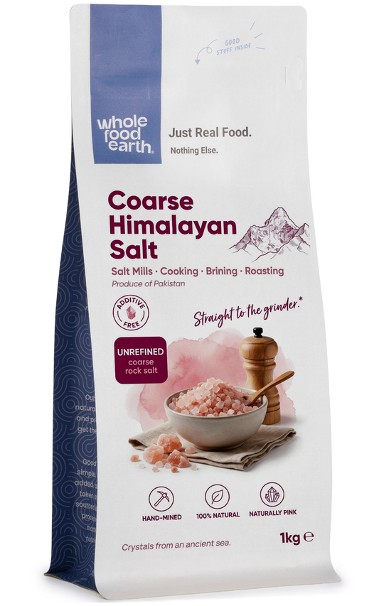 Coarse Himalayan salt crystals, natural minerals and salts from Whole Food Earth, shown in a close-up image.