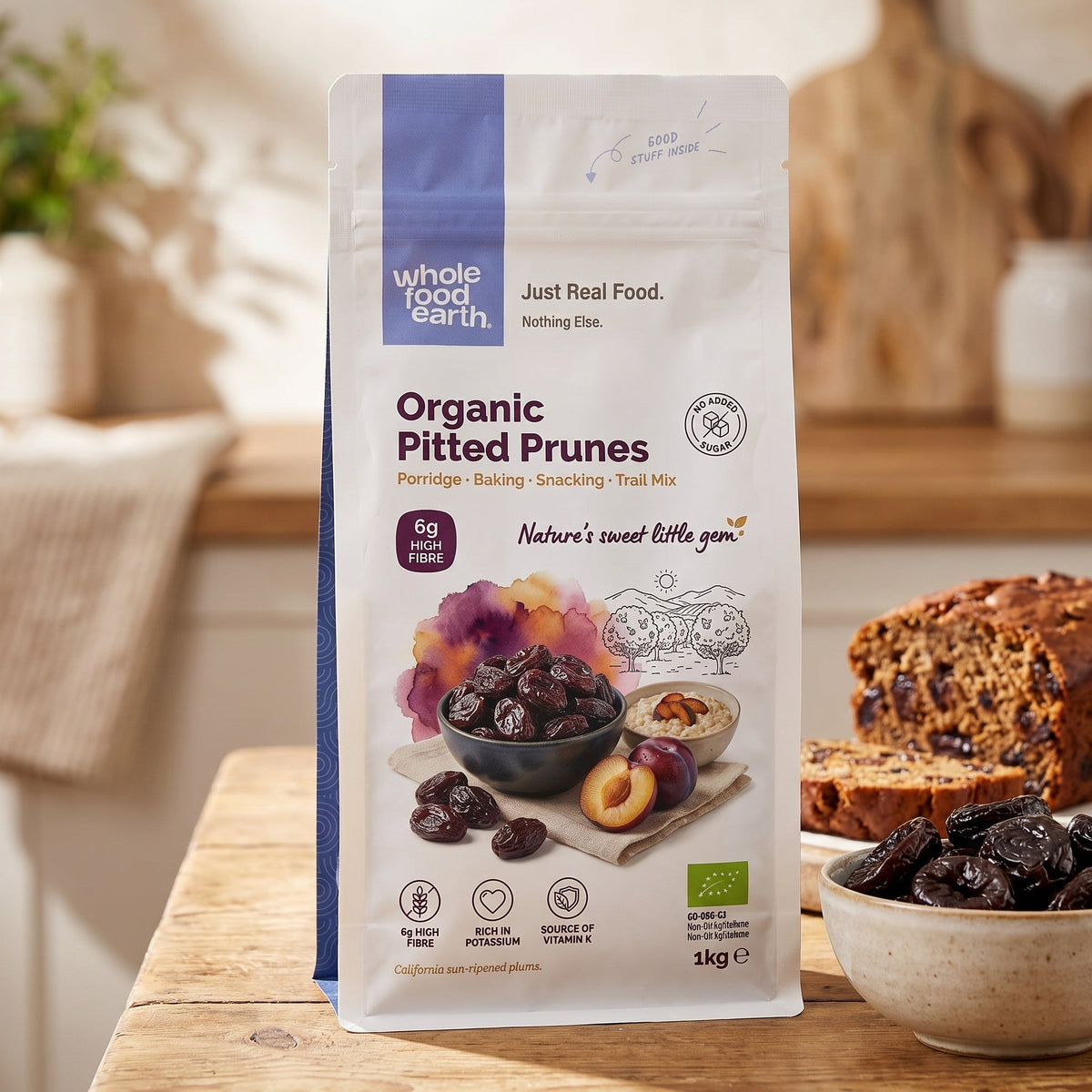 Organic pitted prunes from Whole Food Earth, dried fruits with smooth, dark, and chewy texture, ready for snacking or recipes.