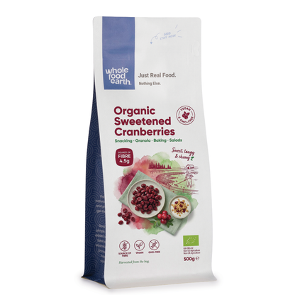 Organic sweetened dried cranberries from Whole Food Earth, close-up view of plump, ruby-red dried fruit pieces.