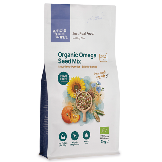 Organic Omega Seed Mix by Whole Food Earth featuring a colorful blend of nutritious seeds in a clear bowl.