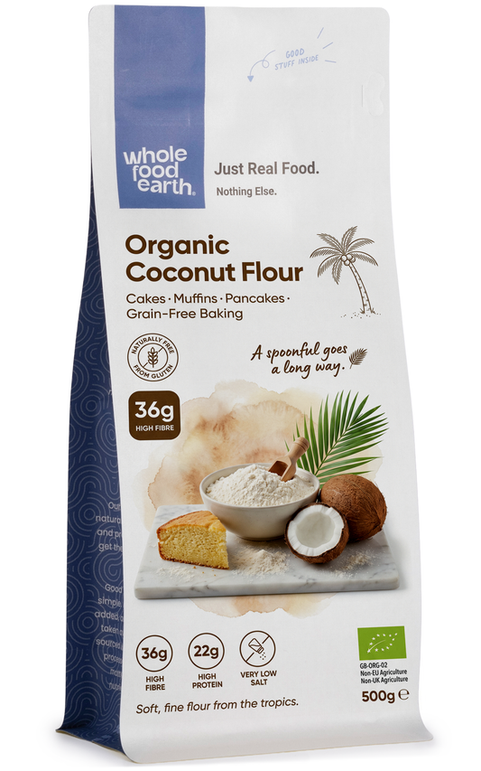 Organic coconut flour in a clear bag from Whole Food Earth, showcasing its fine, white, powdery texture for baking and cooking.
