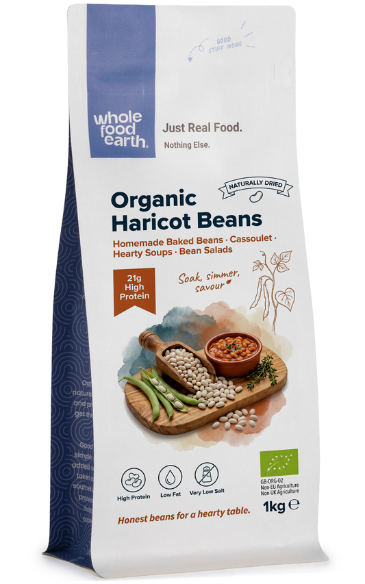 Organic Haricot Beans from Whole Food Earth, close-up of dried white beans in a bowl, showcasing fresh, natural pulses.
