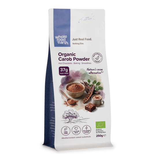 Organic Carob Powder from Whole Food Earth, close-up of the specialty powder in a jar, with a natural, earthy appearance.
