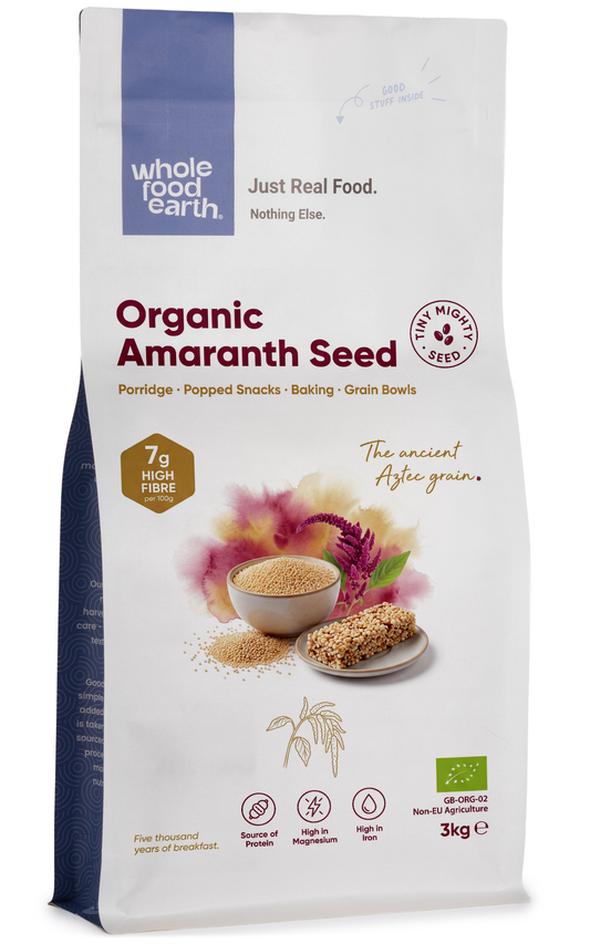 Organic amaranth seeds from Whole Food Earth, small round grains in a clear container, suitable for cooking and baking.