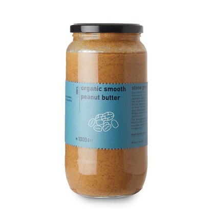 Organic Smooth Peanut Butter from RAWGORILLA, a Nut Butter by Whole Food Earth, shown in a clear jar with smooth texture and natural color.