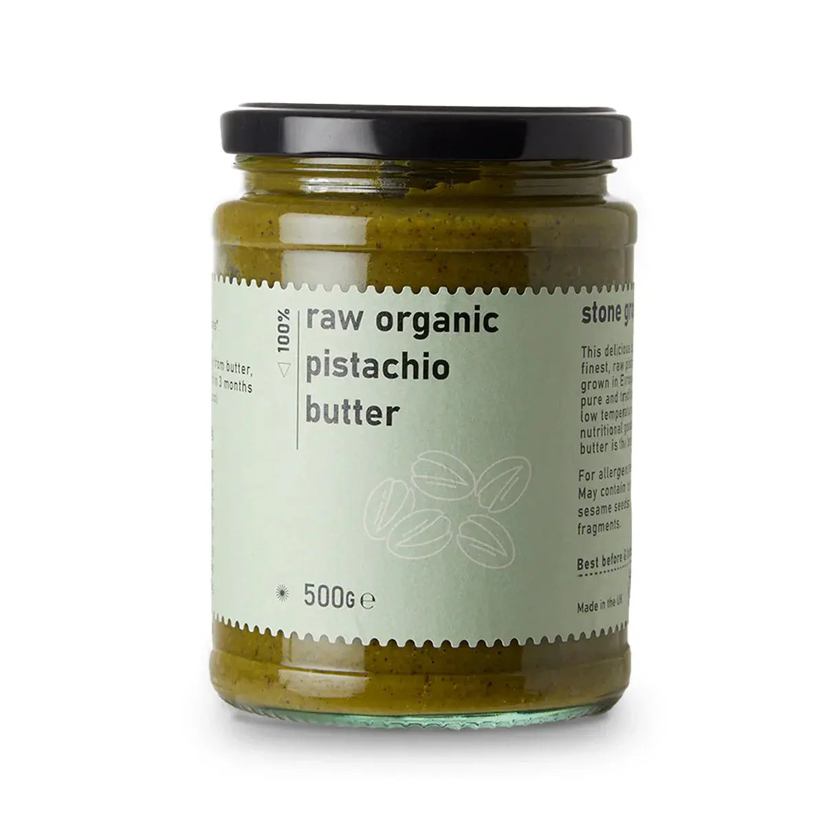 Creamy organic raw pistachio butter in a jar, made by Whole Food Earth, showcasing a smooth, natural nut butter texture.