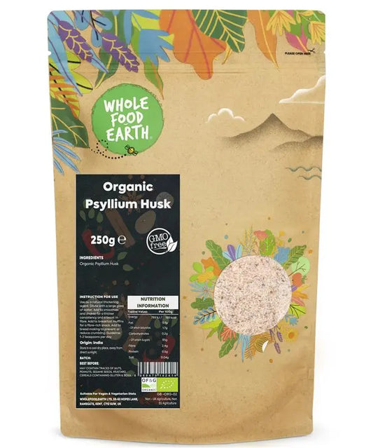 Organic Psyllium Husk from Whole Food Earth in a clear plastic container, showing fine, light brown powdered fiber.