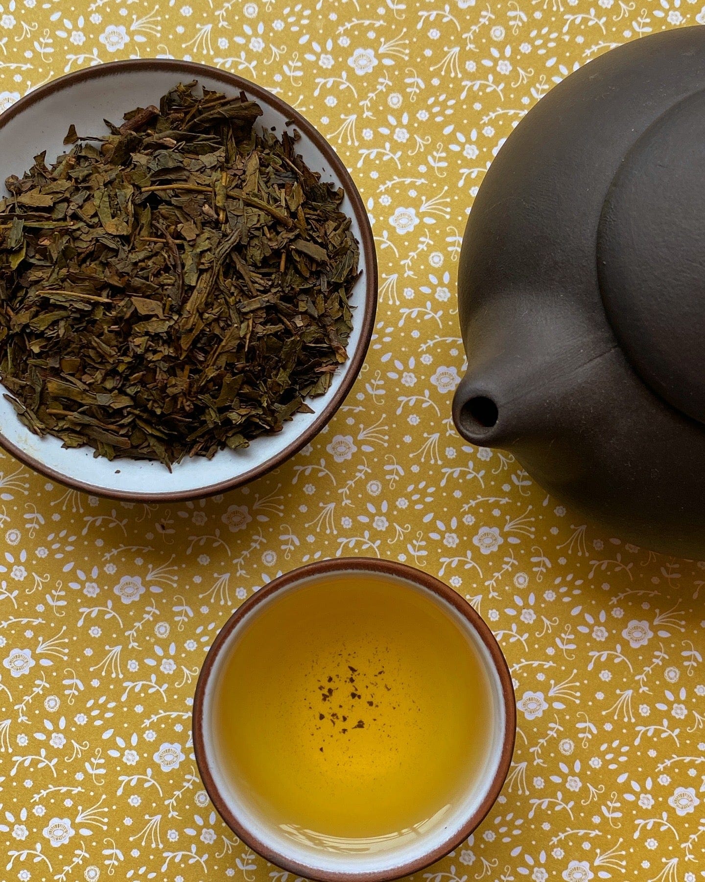 Porter Hill Tea Company hojicha green tea in a clear glass jar with loose tea leaves and roasted aroma visible.
