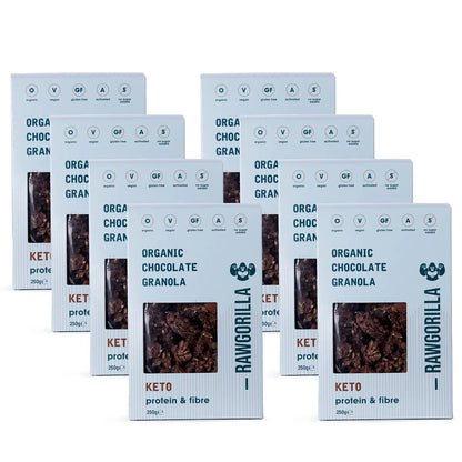 Whole Food Earth organic chocolate granola cereal in a clear bowl, showing crunchy clusters and chocolate pieces.