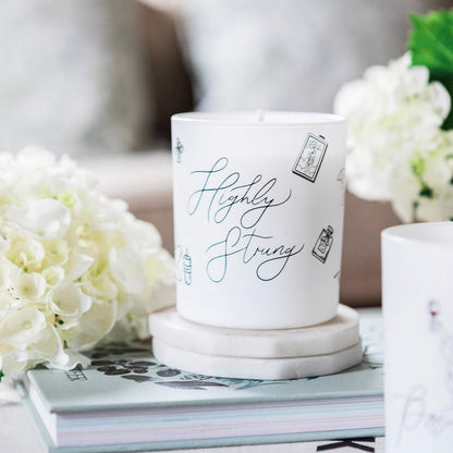 Natural wax glass candle from Avalon Home UK, featuring a sleek design and soft glow in a highly strung style.