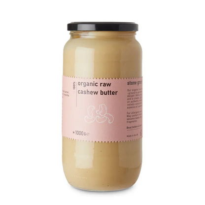 Organic raw cashew butter from Whole Food Earth, showcasing a jar of creamy nut butter with a smooth texture and label.