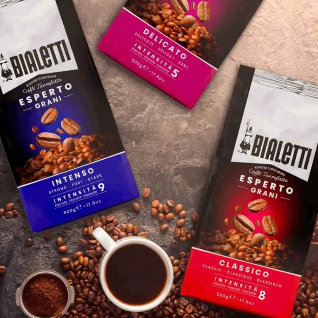 Bialetti Whole Bean Coffee by Brew Italia, fresh roasted coffee beans in a clear bag with a label, ready for grinding.