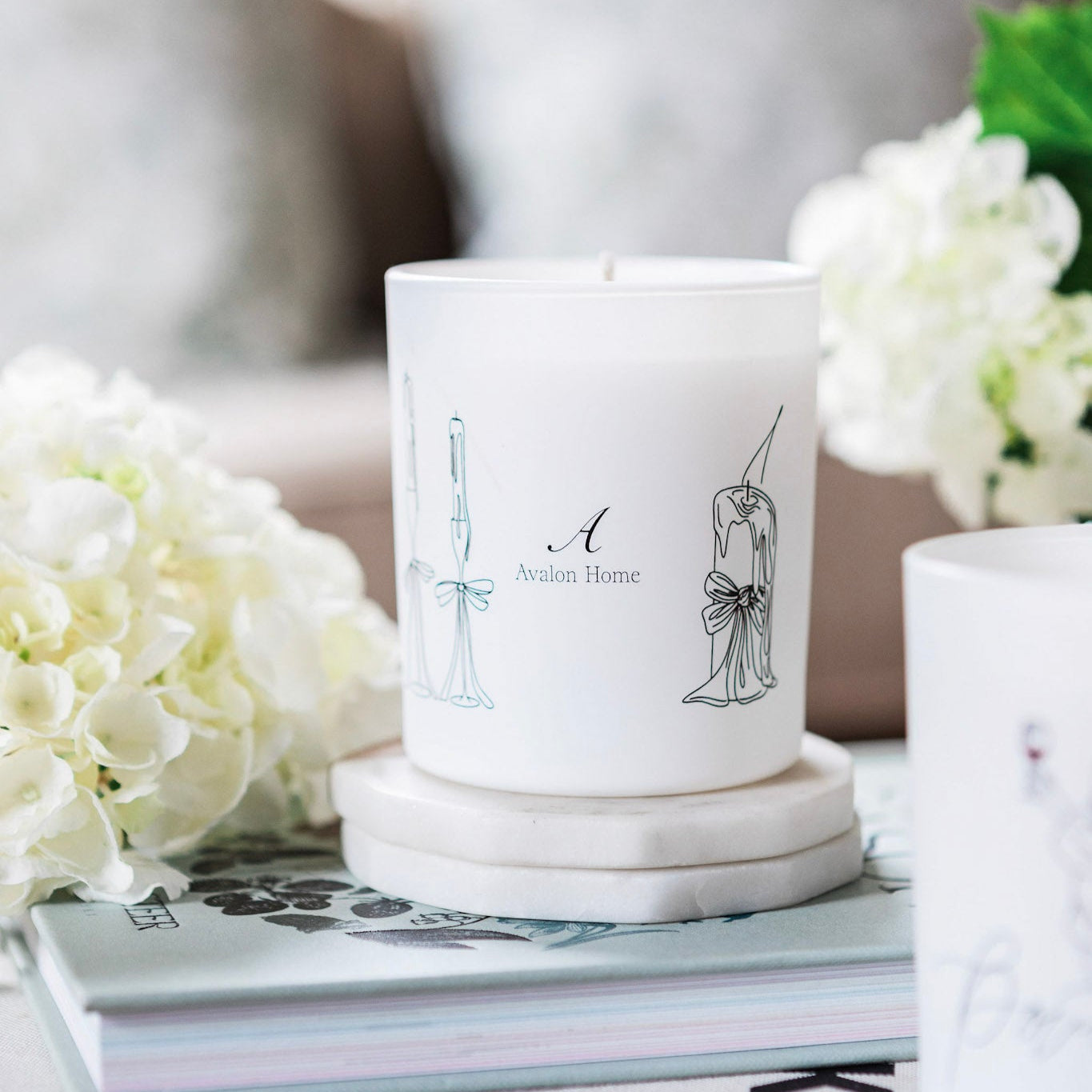 Burnt Out Natural Wax Glass Candle by Avalon Home UK with a clear glass container and a flickering candle flame.