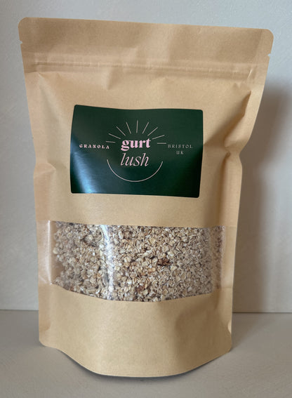 Honey and vanilla granola from Gurt Lush Food Co with clusters of oats, honey, vanilla, and dried fruit in a bowl.