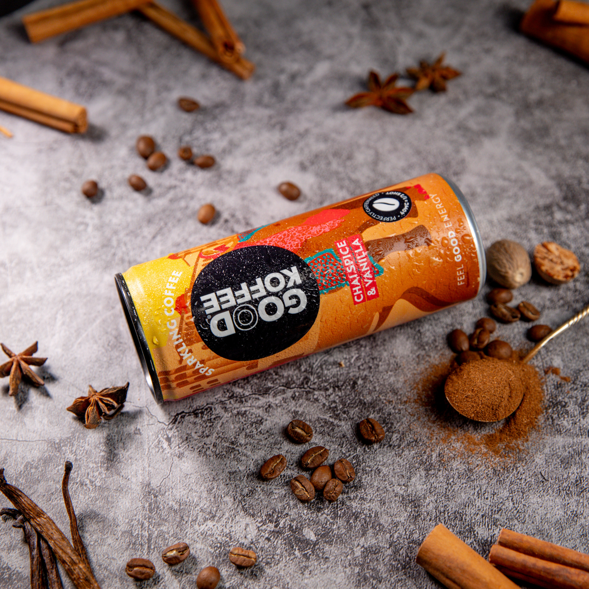 Sparkling coffee by ArtisanBox with chai spice and vanilla flavor in a 12-pack, featuring colorful cans with chai and vanilla ingredients.