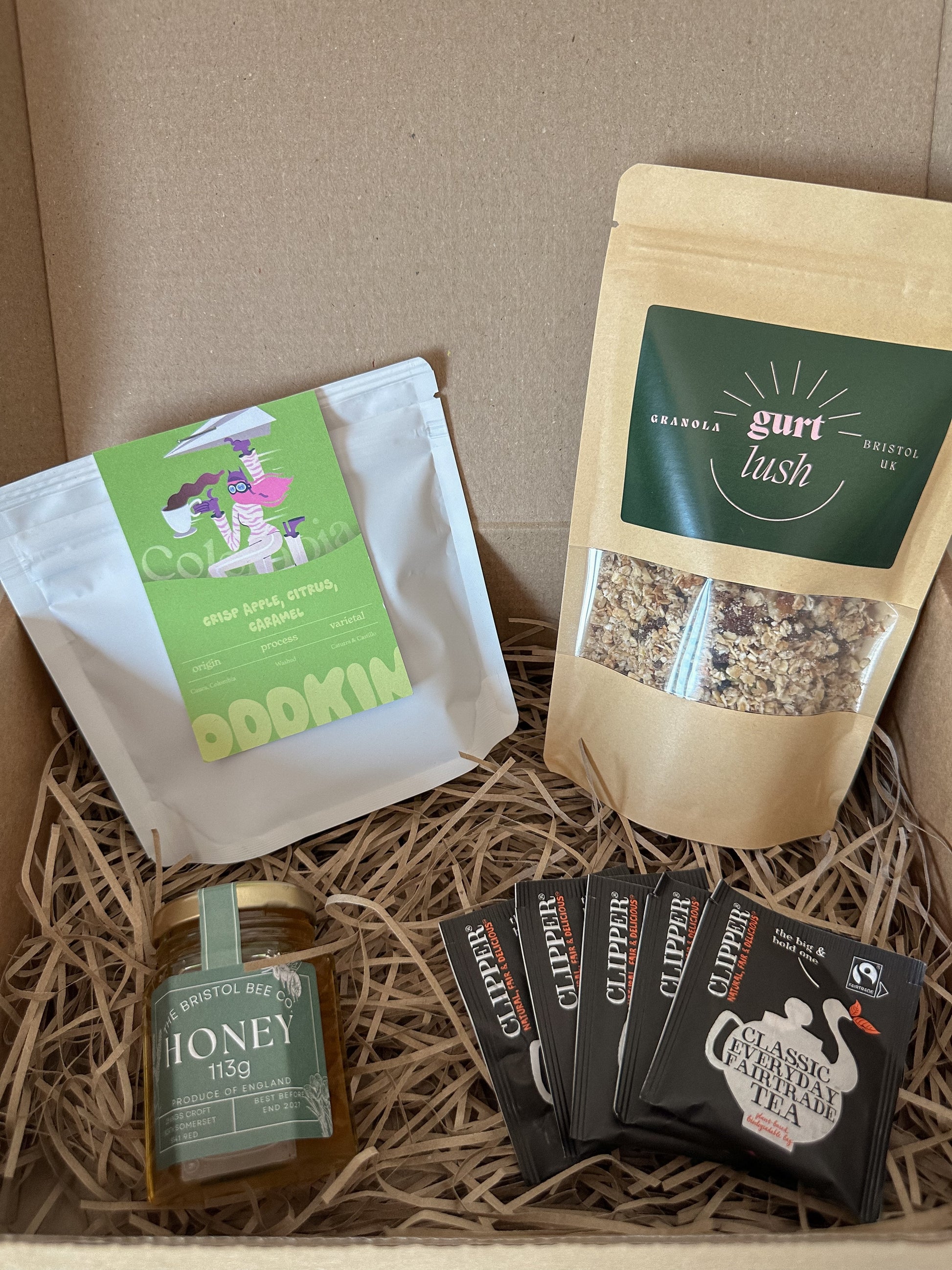 Bristol breakfast hamper from Gurt Lush Food Co featuring assorted breakfast treats in a decorative gift basket.