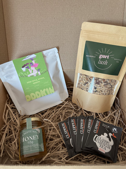 Bristol breakfast hamper from Gurt Lush Food Co featuring assorted breakfast treats in a decorative gift basket.