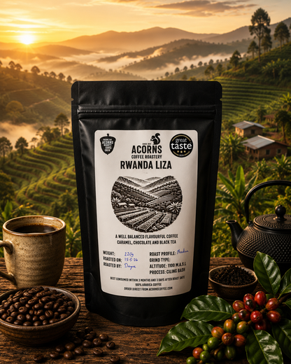Acorns Coffee & Cake Rwanda Liza medium roast coffee packaging with scenic thousand hills background, showcasing premium coffee beans.