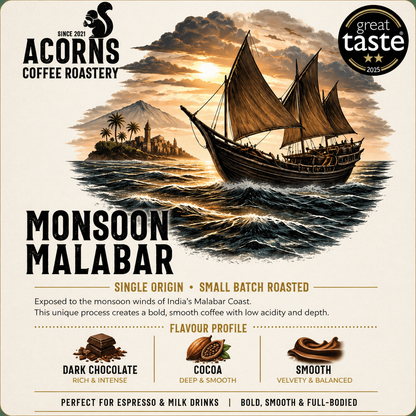 Medium roast Monsooned Malabar coffee beans from India by Acorns Coffee & Cake, showcasing smooth, bold, cocoa-toned beans.