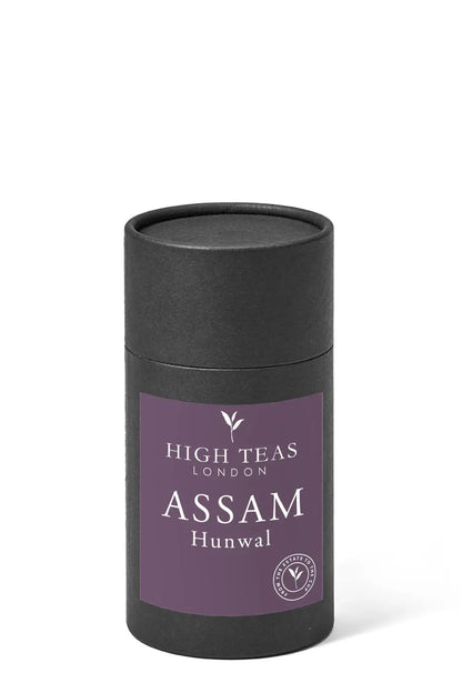 Assam Hunwal 2nd flush TGFOP1 tea leaves from High Teas estate, showcasing fresh, golden-tipped tea in a natural setting.