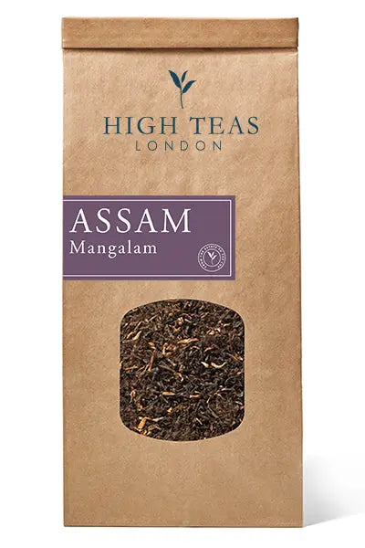 Assam Mangalam FTGFOP1 tea leaves from High Teas, showcasing dried golden-orange leaf tips and rich, aromatic Assam tea.