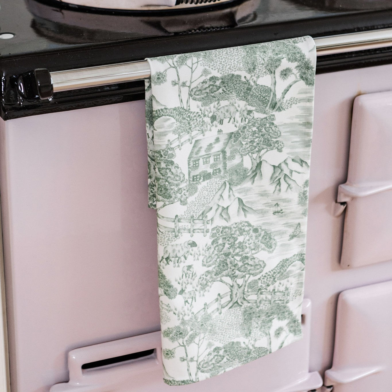 Lake District Toile tea towel by Avalon Home UK featuring classic scenic print with lakes and mountains in soft colors.