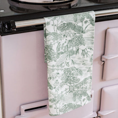 Lake District Toile tea towel by Avalon Home UK featuring classic scenic print with lakes and mountains in soft colors.