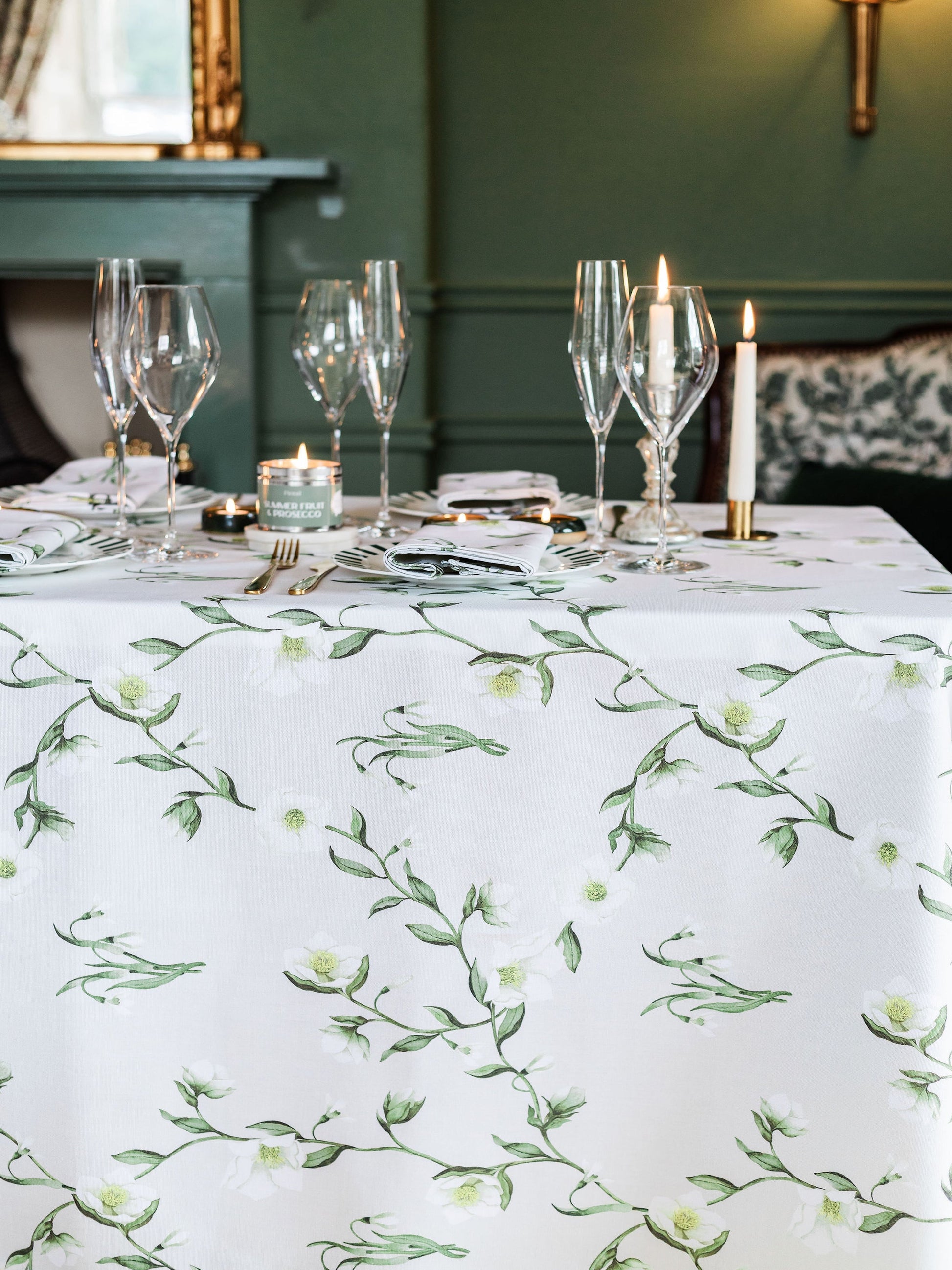 Snowdrop and hellebore floral tablecloth by Avalon Home UK, featuring a spring-inspired botanical pattern on a light fabric.