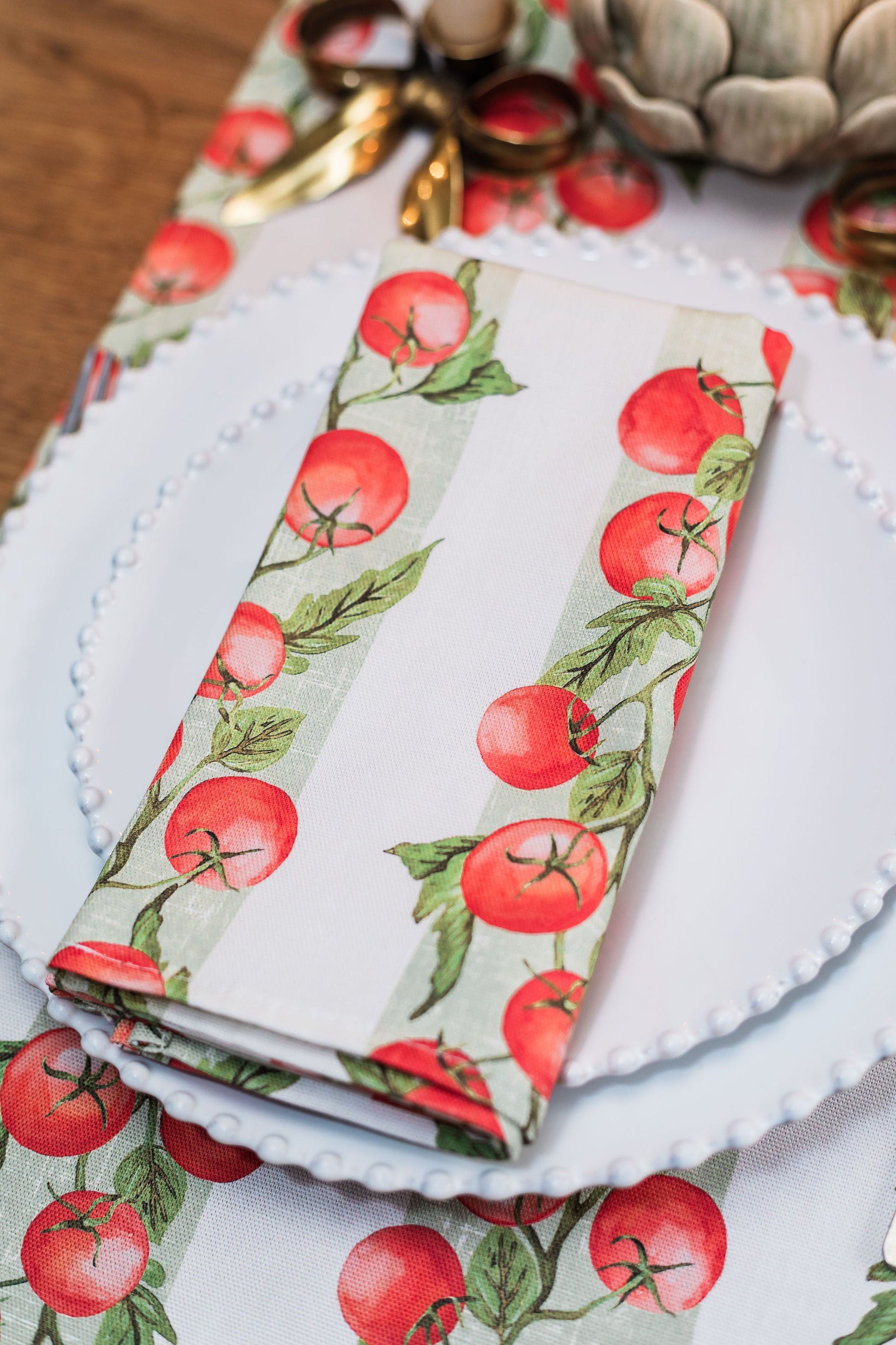 Pair of Vine Tomato napkins from Avalon Home UK with a vibrant, spring-summer floral design.