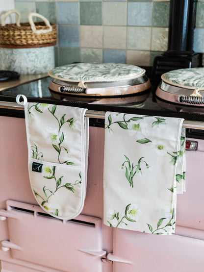 Snowdrop and hellebore floral tea towel from Avalon Home UK featuring spring blooms in vibrant colors.