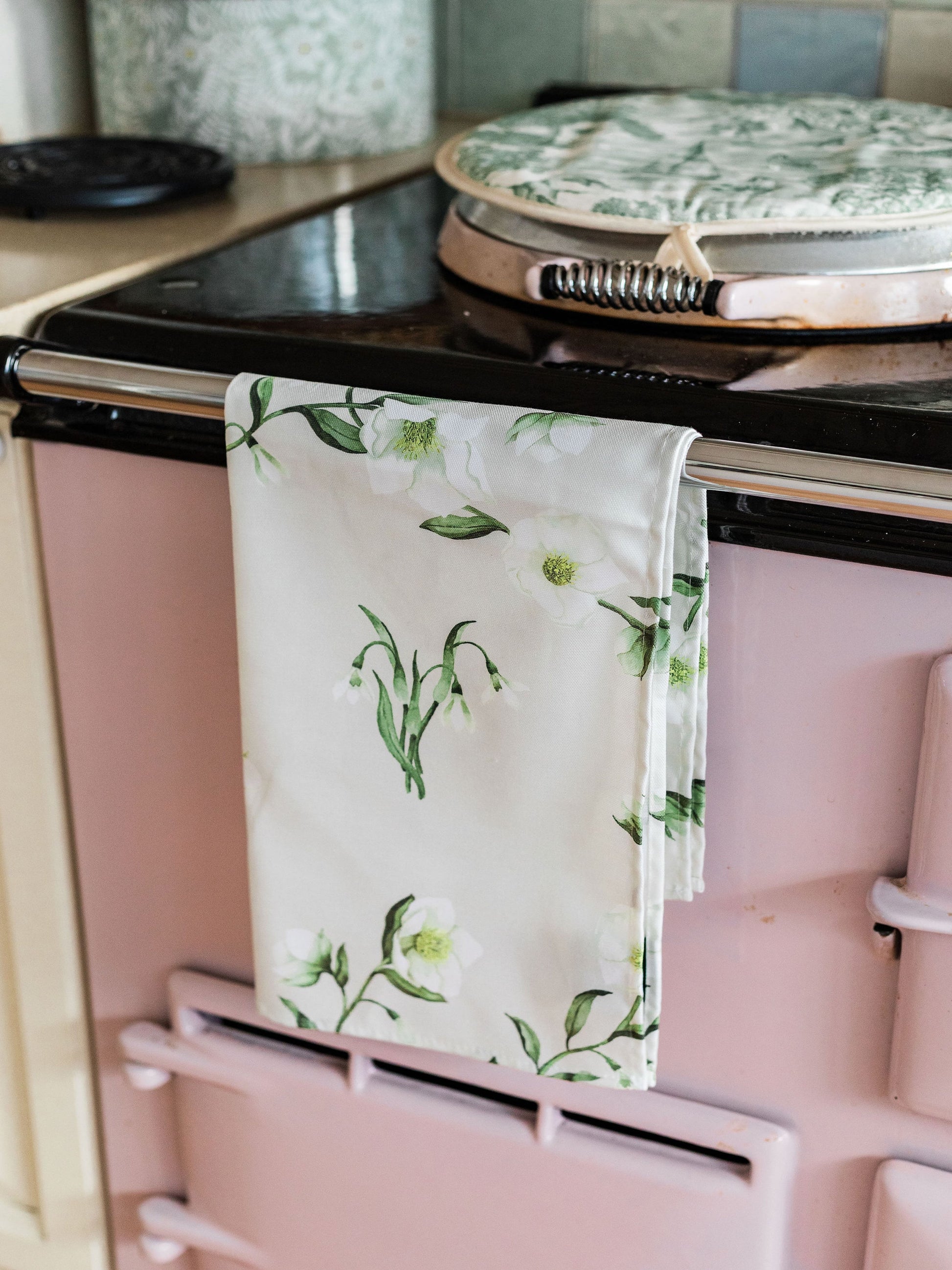 Snowdrop and hellebore floral tea towel by Avalon Home UK, featuring spring floral designs on soft fabric.