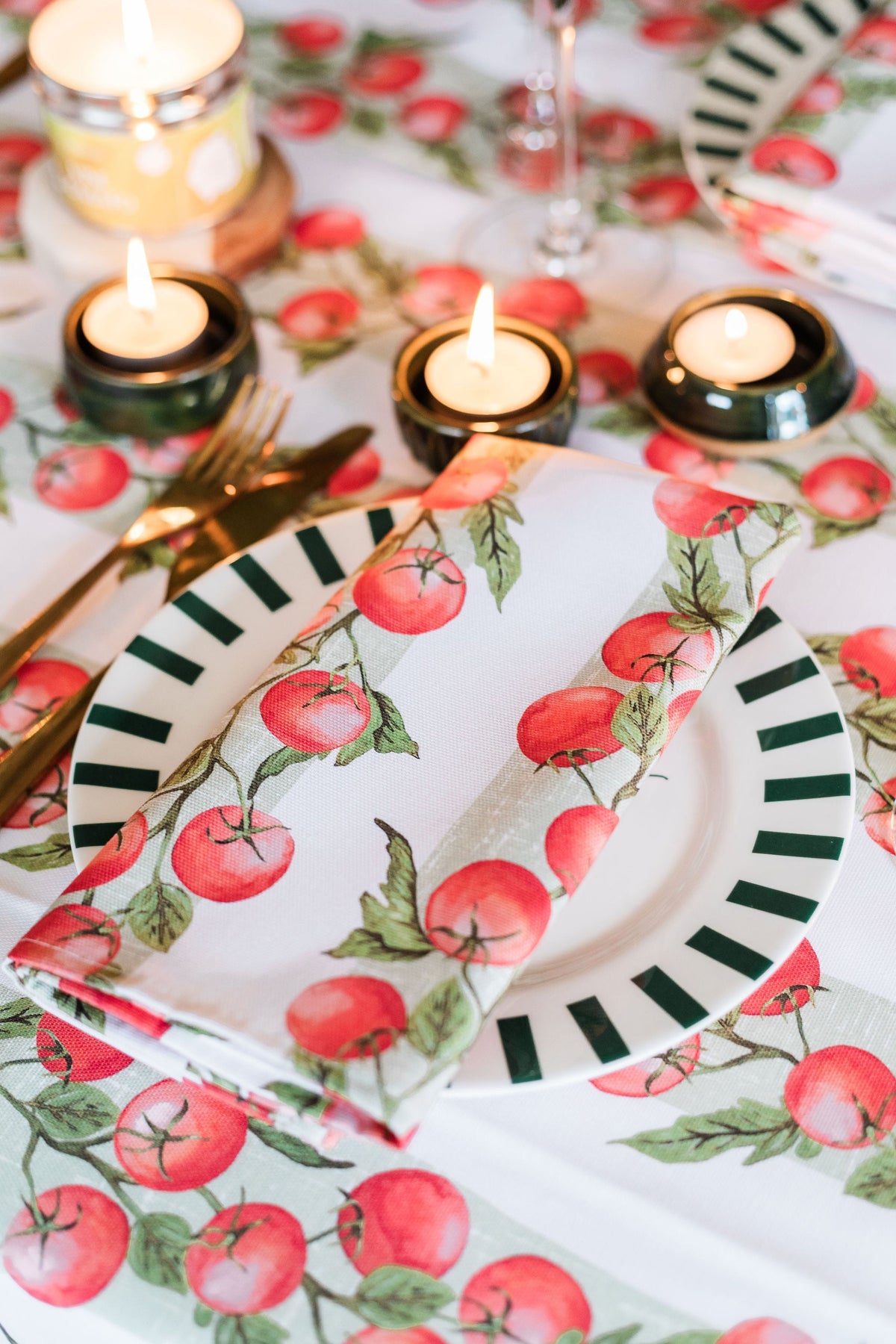Pair of Avalon Home UK Vine Tomato napkins with vibrant tomato print for spring and summer table décor.