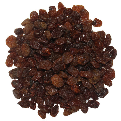 A close-up of Whole Food Earth Lexia raisins, dried fruit in a clear container showcasing glossy, plump dried grapes.