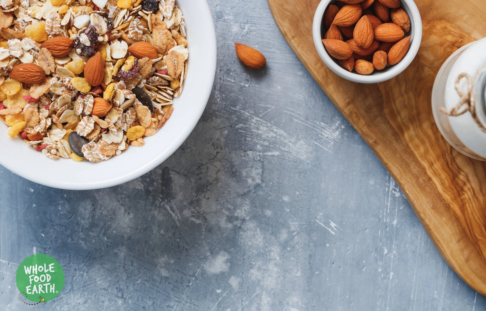 Whole Food Earth High Fibre Fruits Muesli cereal with flakes, dried fruit, and nuts in a bowl, healthy breakfast option.