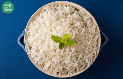 White Basmati rice from Whole Food Earth, showcasing a close-up of long, slender grains in a neat pile.