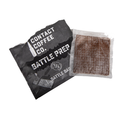 Single serve coffee bag labeled Battle Prep from Contact Coffee Company Ltd., ready for brewing.