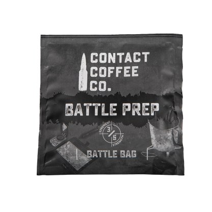 Single serve coffee brew bag from Contact Coffee Company Ltd. with coffee grounds visible inside, ready for brewing.
