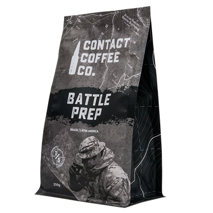 ArtisanBox Battle Prep Coffee bag with label, featuring bold branding and a sleek black and gold design.