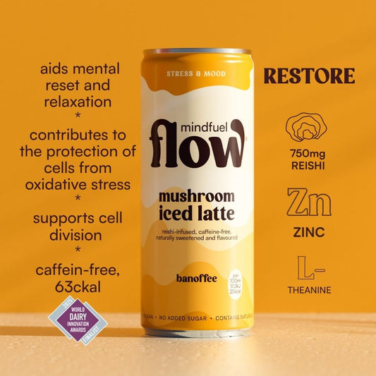 Reishi oat latte with banoffee flavor from MINDFUEL FLOW, showcasing a creamy, layered functional drink in a clear glass.