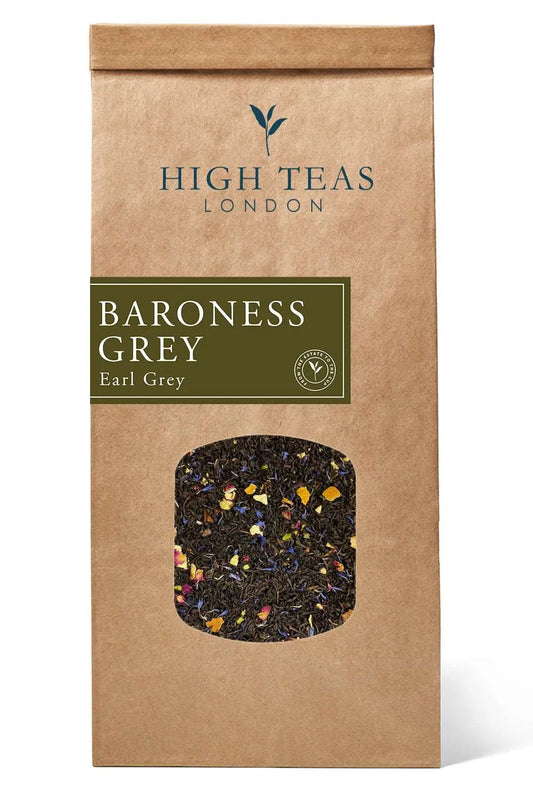 Loose leaf Baroness Grey Blend tea by High Teas, showing a close-up of the fragrant grey tea leaves in a clear container.