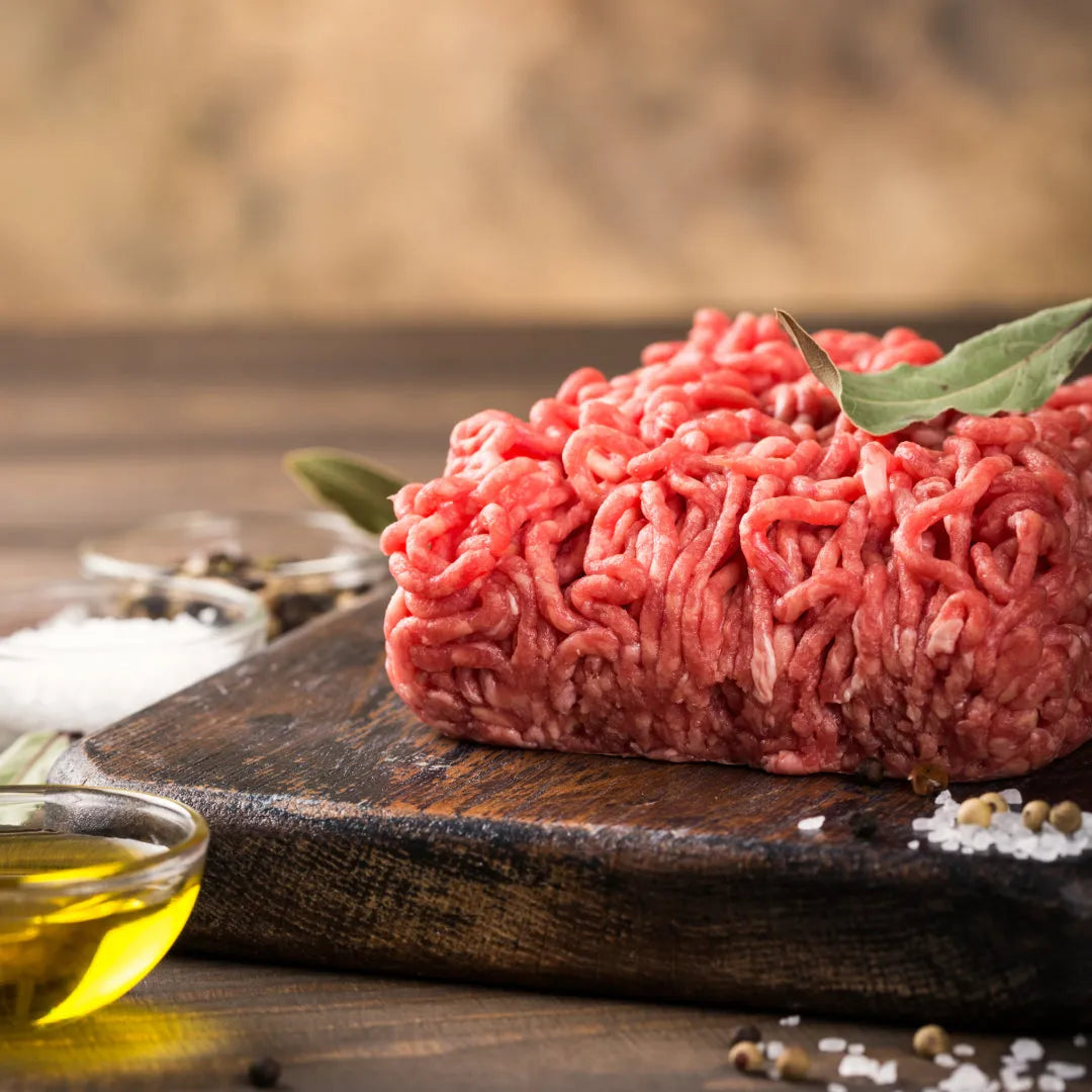 Fresh Primrose Herd beef mince, 500g package, showing finely ground beef in a clear container.