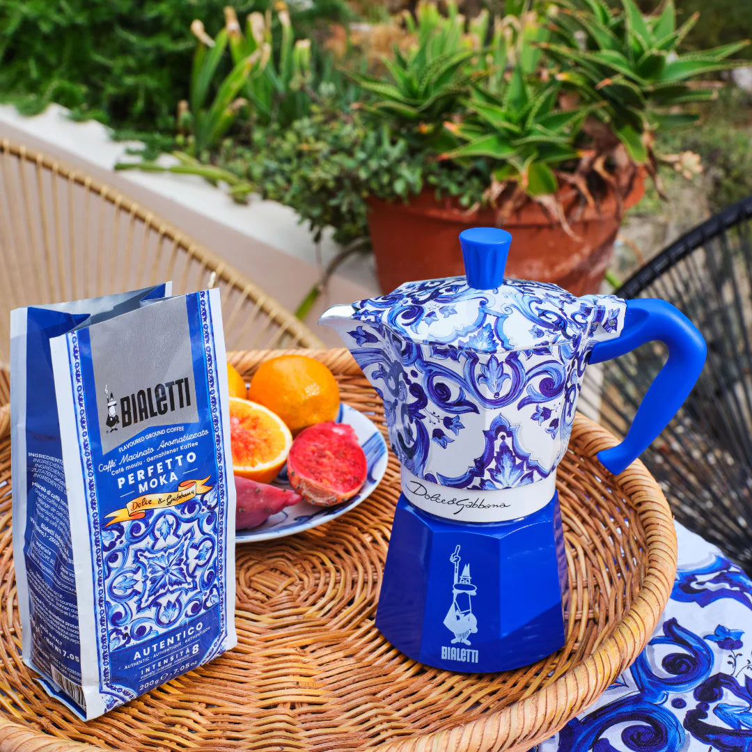 Bialetti X Dolce&Gabbana Blue Mediterranean gift set with 6-cup Moka espresso maker and stirrer from Brew Italia, featuring vibrant blue design.