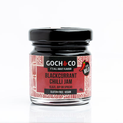 Blackcurrant chilli jam jar by Goch & Co showing vibrant blackcurrants and red chilli peppers on the label.