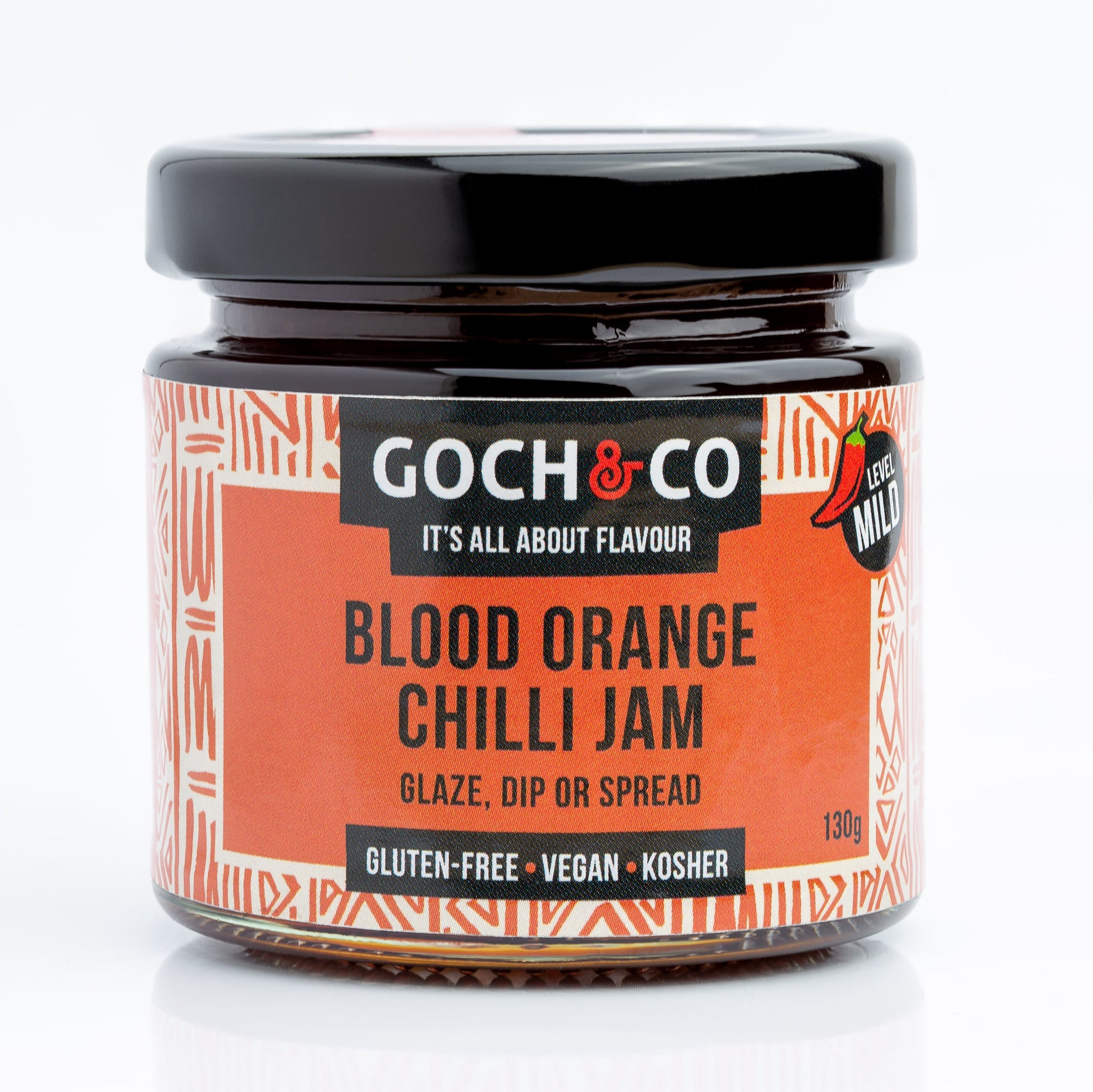 Jar of Goch & Co Blood Orange Chilli Jam showing vibrant orange jam with chili pieces and a label on the jar.