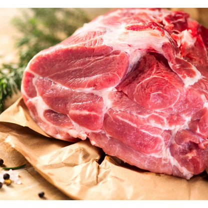 Primrose Herd Boston Butt pork joint, seasoned and ready for cooking, showing a fresh, well-trimmed pork shoulder cut.