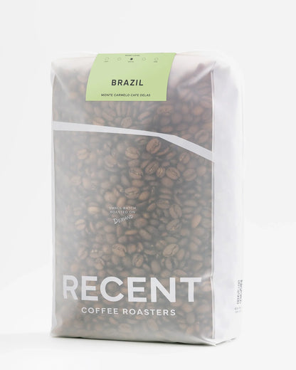 Brazilian Eagle Monte Carmelo medium roast coffee by Recent Beans in a 1kg bag, showing the coffee beans and packaging.