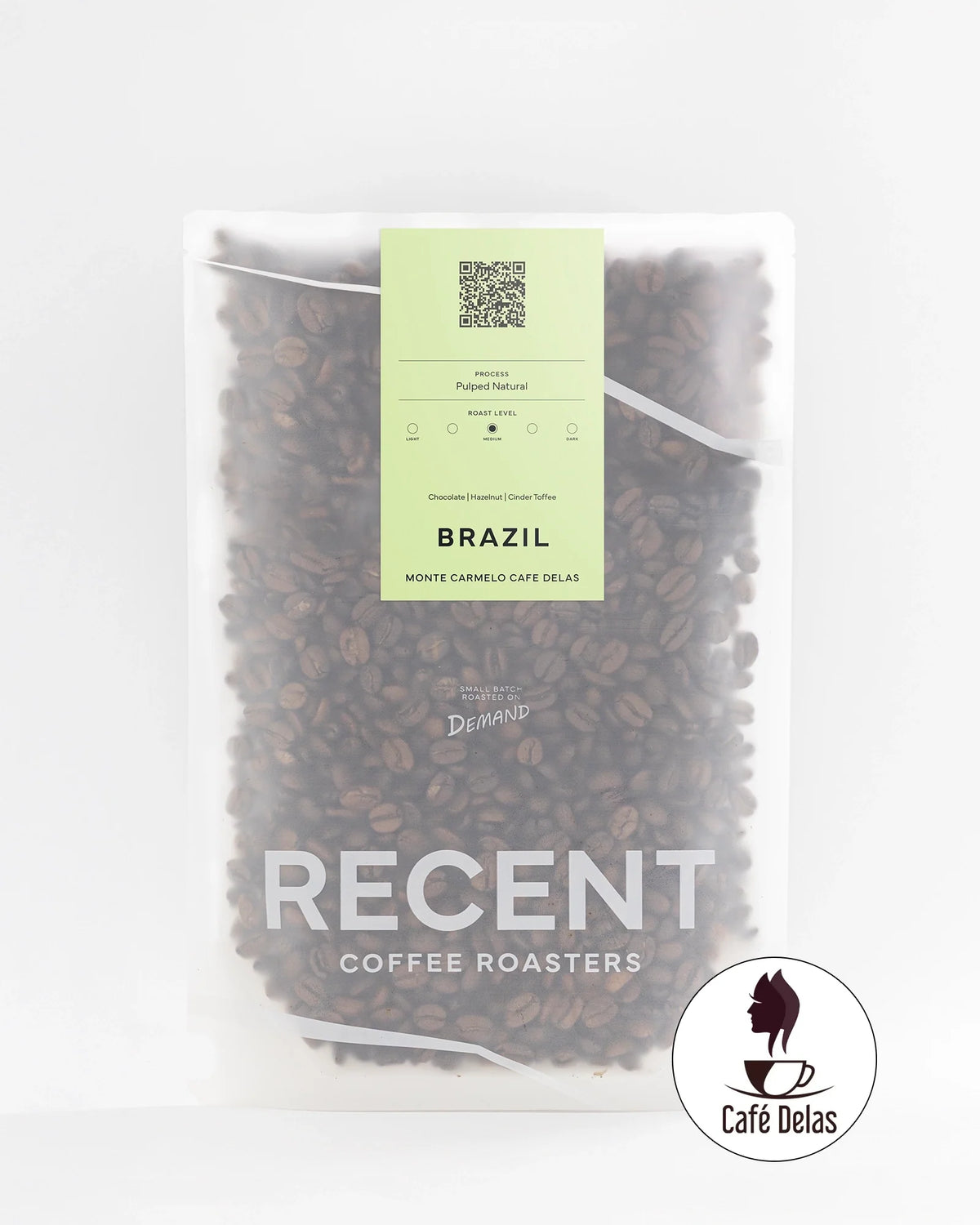 Brazilian Eagle Monte Carmelo medium roast coffee bag from Recent Beans, with a sleek design and fresh coffee beans visible.
