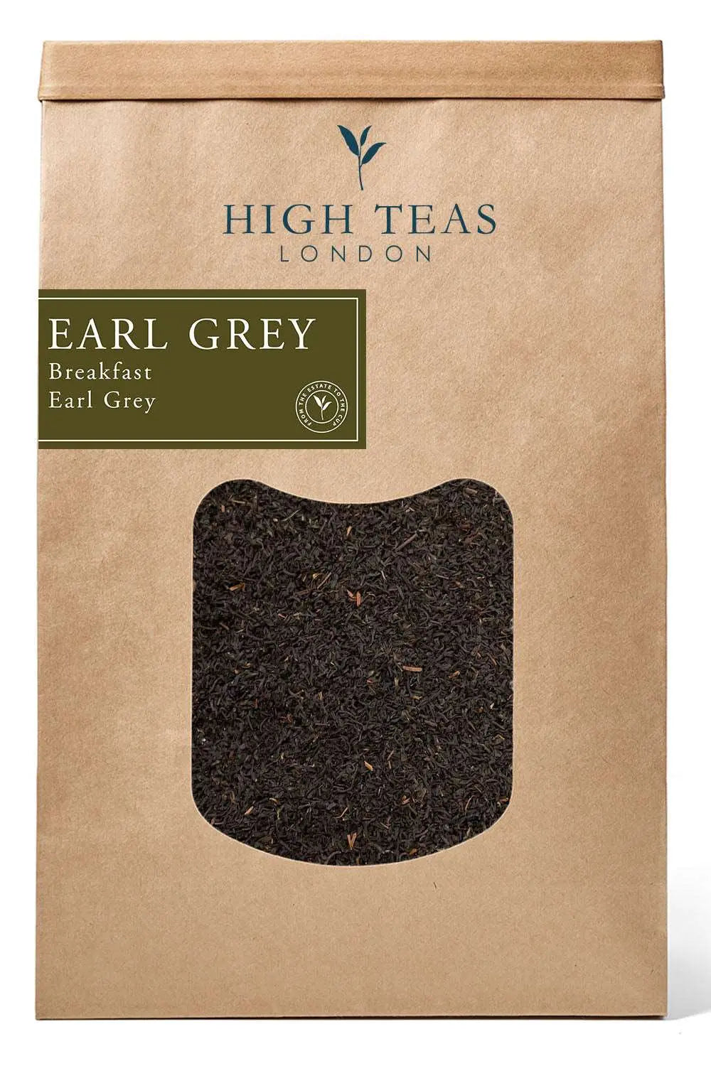 A package of High Teas Breakfast Earl Grey tea with tea leaves and a steaming cup of brewed tea on a wooden table.