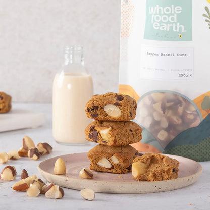 Broken Brazil nuts from Whole Food Earth, showing their rough, broken shells and creamy nut meat inside.